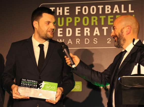 Glen Wilson (left) collects his award at the Football Supporters Federation dinner. (Photo: FSF).