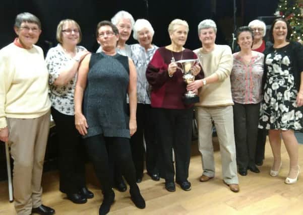 Carcroft Village, pictured with Mayor Ros Jones at the recent presentation night, won the league title.