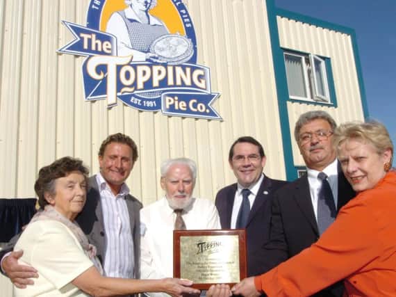 Bill Topping, third from left, in 2007 at the opening of the new Topping Pie Company factory.