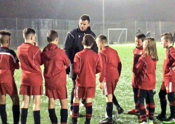 Andy Butler coaches Rovers' under-12s in his spare time.