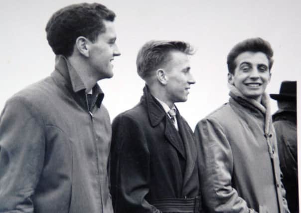 50th anniversary of Manchester United Munich air crash...one of the players who died was David Pegg of Doncaster... Picture shows from left Tommy Taylor, Bobby Charlton and David