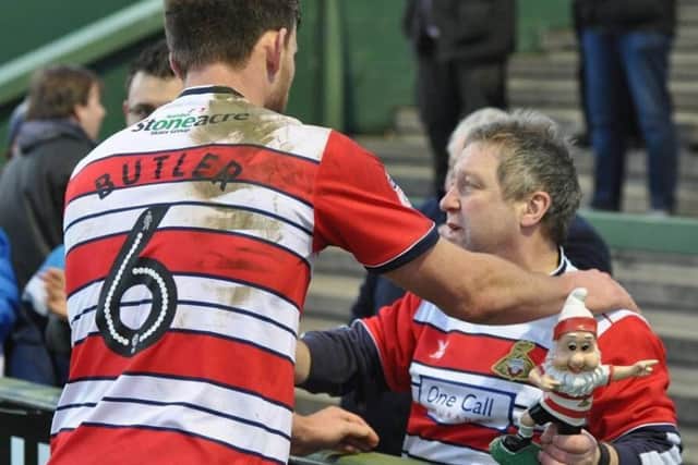 Andy Butler consoles Paul Mayfield. Photo: Phil Ryan