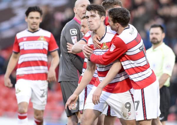 John Marquis is congratulated after scoring the equaliser