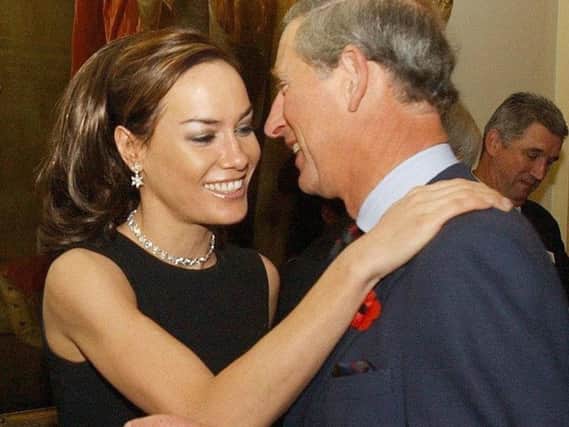 Tara Palmer-Tomkinson greets Prince Charles.