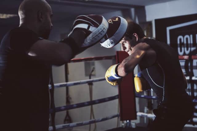 Gavin McDonnell working the pads with trainer Dave Coldwell. Picture By Mark Robinson