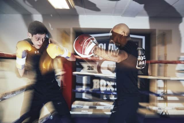 Gavin McDonnell with trainer Dave Coldwell. Gavin McDonnell. Picture: Mark Robinson