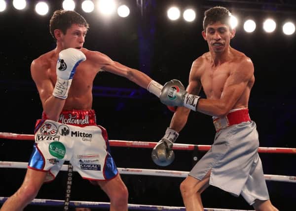 Gavin McDonnell rocks Rey Vargas with a left hand. Picture: Lawrence Lustig
