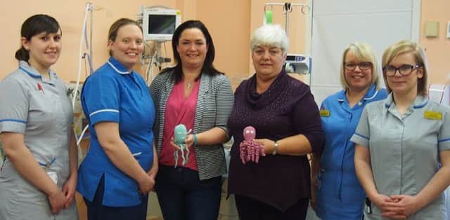 With some of the octopus are healthcare assistant Leanne Wilson, staff nurse Emily Whittle, Pippa Curtin, Pippas mum Val Lawson, senior staff nurse Belinda Westfield, advanced healthcare assistant Lucie Close