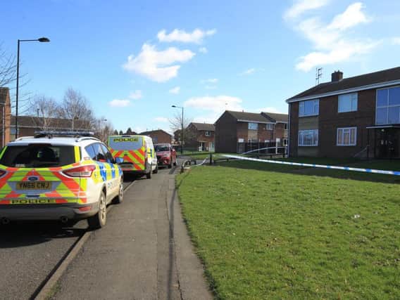 Police at the scene on Wadworth Street in Denaby Main after an 18 year old man was killed. Picture: Chris Etchells