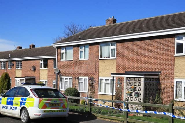 Police at the scene on Wadworth Street in Denaby Main after an 18 year old man was killed. Picture: Chris Etchells