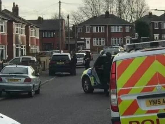 Armed police are currently in attendance at an ongoing incident on a South Yorkshire street.