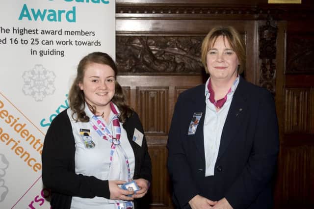 Katie Wormald, aged 21, of Doncaster, (left) receiving her Queens Guide Award at the House of Commons on Saturday 11 March by Val Elliott, the Interim Chair of Girlguidings Board of Trustees.