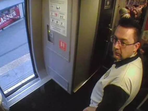 The CCTV image of the man on the train.