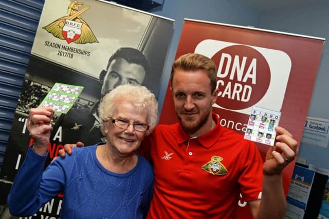 Avid Rovers supporter and season ticket holder Sheila Wrathall, 84, of Intake with James Coppinger, during the community event at Intake Library. Picture: Marie Caley