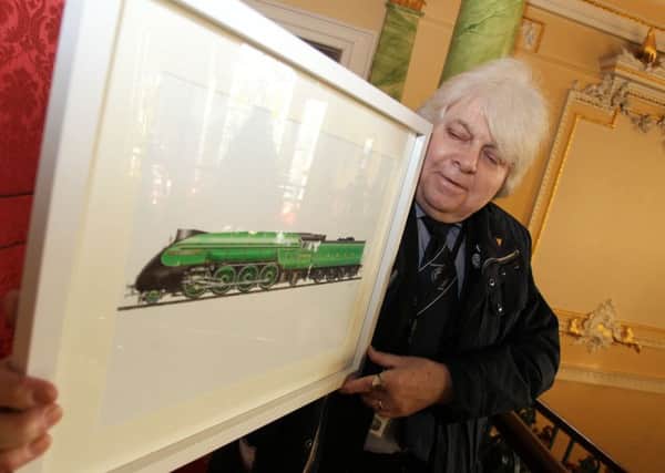 David Court with a picture of the engine the trust is hoping to build