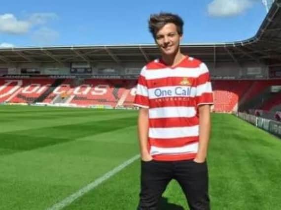 Louis Tomlinson.