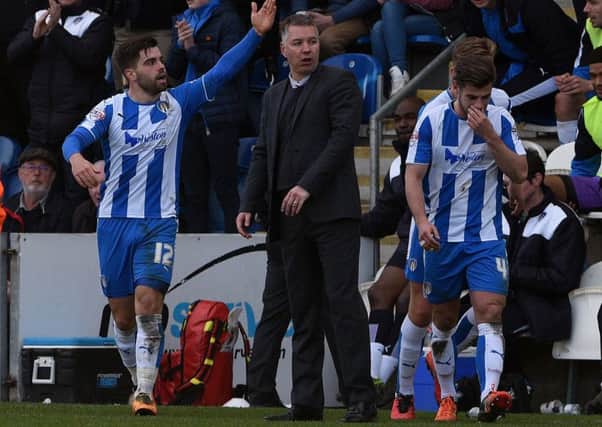 Darren Ferguson shows his fury as Colchester celebrate another goal
