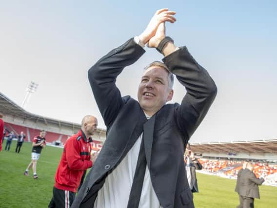 Darren Ferguson salutes supporters after confirmation of Doncaster Rovers' promotion