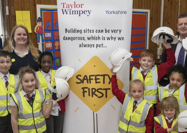 Pictured at St Joseph's Catholic Primary School, Bevan Av, Rossington Doncaster South Yorkshire
where Taylor Wimpey's Keith Chester & Assistant Site Manager from Holly Inn Emma , visited the School to give the Pupils a health & Safety Talk. on 21st March 2017