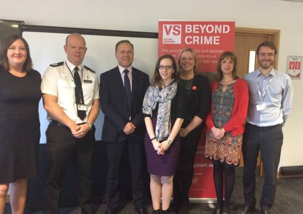 From left, Marie Carroll, Assistant Crime Commissioner Tim Forber, Crime Commissioner Keith Hunter, Nicola Swan, Johanna Parks, Lynne Casserly, and Ben Payne at the launch