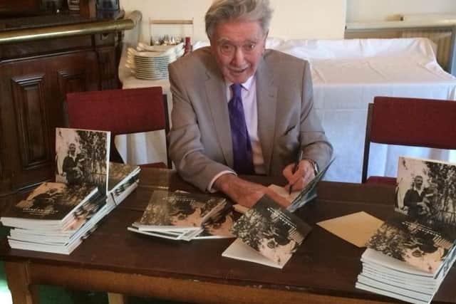 Noel at his book signing