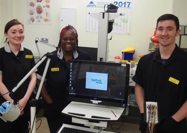 With the new EEG machine are (left to right) trainee Liz Wall, clinical physiologist Evadne Cookman and trainee Chris Hett