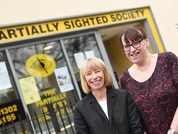 Partially Sighted Society chief executive Anita Plant and staff member Michaela Etherington urge you to get your ticket to the black tie ball