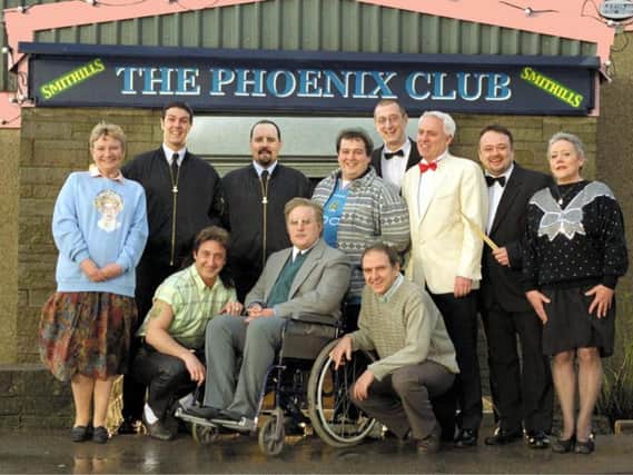 Toby Foster, back, second from right, in Phoenix Nights in 2002.