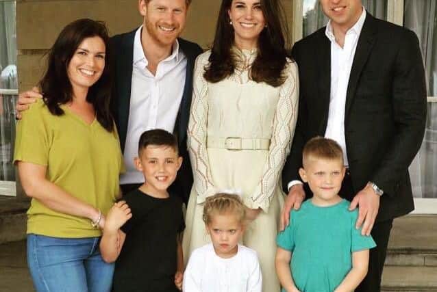 Samantha Davidson and her children Jayden, Amelia and Jamie with Prince Harry and the Duke and Duchess of Cambridge