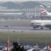 Planes take off from Heathrow Airport.