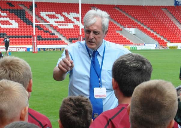 Ray Green chats to youngsters at the Keepmoat Stadium. Photo: Rob Terrace