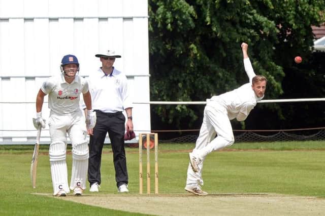 Billy Root, younger brother of England captain Joe, bowls for Sheffield Collegiate against Tickhill.