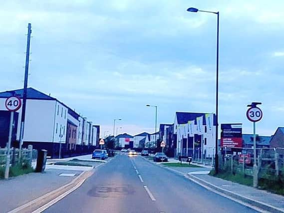 The signs in Woodfield Way, Balby. (Photo: Becky Fowler).