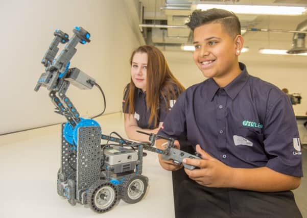 Ajdingh and Holly get first hand robotics experience as UTC Leeds opens its doors to pupils for the first time
