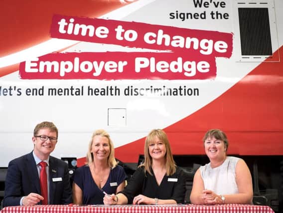 Virgin Trains East Coast's David Horne, Managing Director, Suzanne Donnelly, Commercial Director and Clare Burles, People Director, with Jo Loughran, Director of Operations at Time to Change.