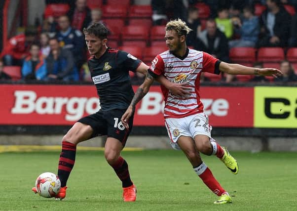 Alex Kiwomya battles with fellow Chelsea youngster Jordan Houghton during their respective loan spells with Rovers and Crewe Alexandra