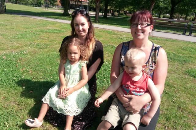 Samantha Thorpe-Aiken with daughter Lola, two, and Erica Ottwell with son Jenson , two; at Bentley Park