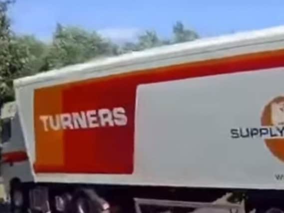 The Turners lorry careers to one side. (Photo: YouTube).