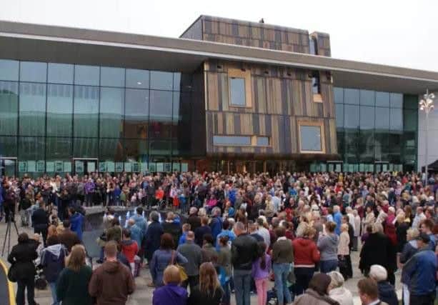 Crowds outside Cast Theatre.
