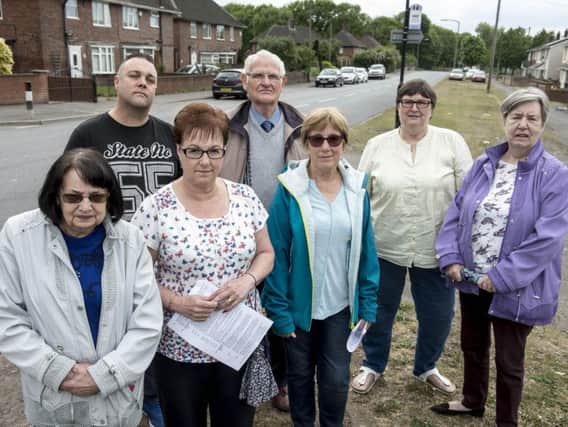 Angry residents of West End Lane in Rossington who say they are plagued by flies from a local recycling plant
