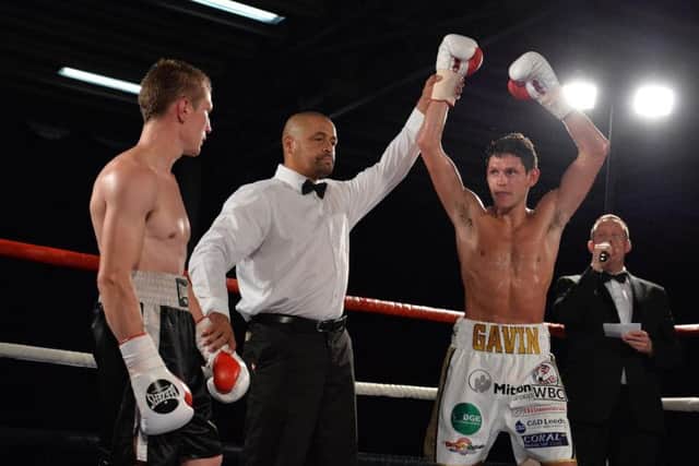 Gavin McDonnell has hid hand held aloft following his win over Simas Volosinas. Picture: Dean Woolley