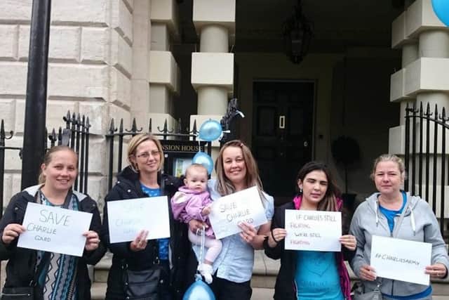 A group of mums stage their protest for Charlie Gard outside the Mansion House.