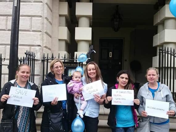 A group of mums stage their protest for Charlie Gard outside the Mansion House.