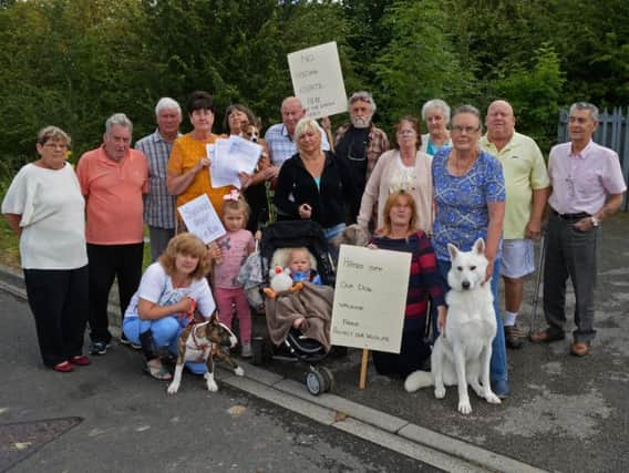 Residents from Ivor Grove and Evanston Gardens protested against plans to build  new homes on their doorsteps.