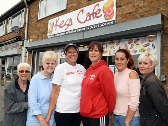 Kelly Roberts and her mum Sandra Roberts, pictured with l-r Sylvia Townsley, Maureen Minshaw, Donna Standish and Sam Morrell, just a few of the community members who rallied around to help them get the business back on its feet. Picture: Marie Caley NDFP Kesa Cafe MC 1