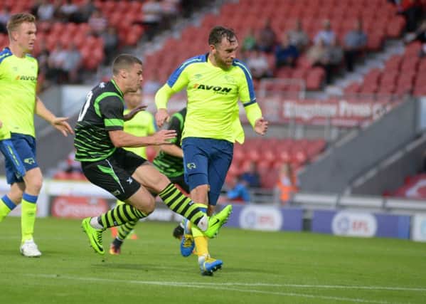 Tommy Rowe slams in the equaliser against Derby. Picture: Marisa Cashill