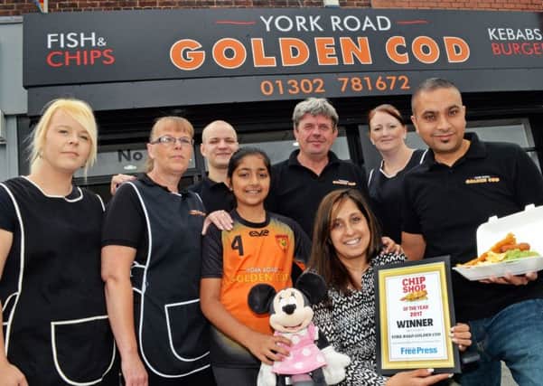Chip Shop of the year 2017 winners, York Road Golden Cod. Back L-r Clare Boydell, Sam Moore, Robert Licbarski, Graham Hill and Amy Oulton. Front L-r Sohni Kaur, ten, Satti Kaur and Bob Singh, owners. Picture: Marie Caley NDFP Chippy GoldenCod MC 1
