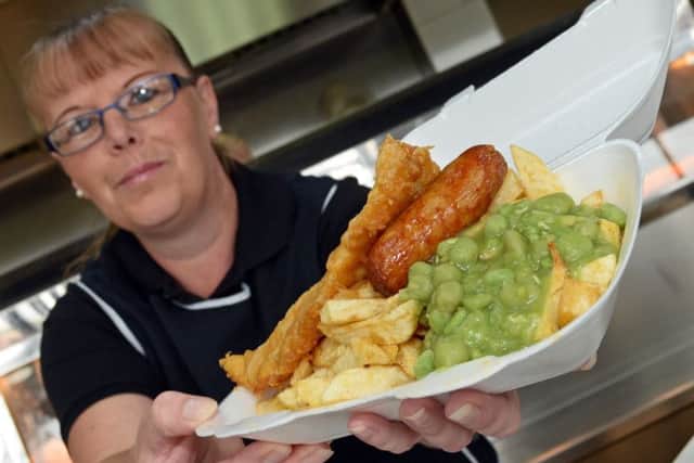 Sam Moore, pictured serving at the York Road Golden Cod. Picture: Marie Caley NDFP Chippy GoldenCod MC 4