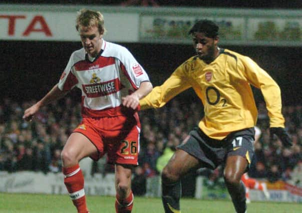 James Coppinger is pictured in action during Doncaster Rovers' famous League Cup quarter-final against Arsenal in 2005 - which Rovers lost on penalties after a night of high drama at Belle Vue.