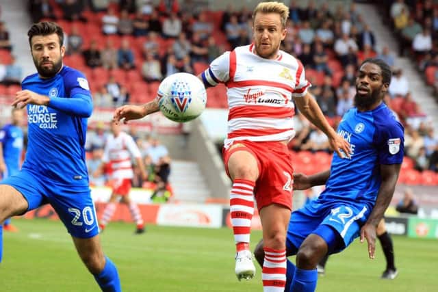 James Coppinger gets the ball under control.
